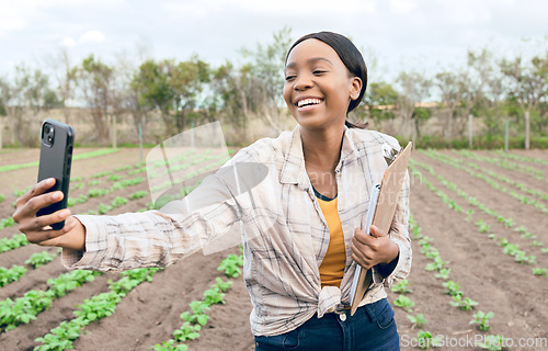 Image of Black woman, farm and agriculture selfie with farmer in harvest field for farming and sustainability outdoor. Smile in picture, smartphone and clipboard for crop check and inspection, green and soil.