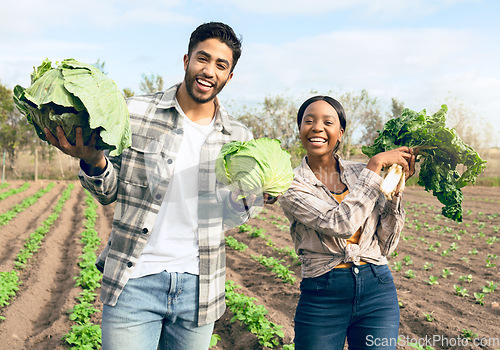 Image of Farming, harvest and interracial couple with vegetables from their sustainable, agro and agriculture farm. Sustainability, small business and portrait of man and woman with growth from food on field