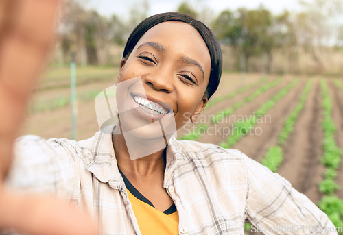 Image of Agriculture, farm and selfie of happy black woman smiling and taking picture outdoors. Agro, sustainability and self portrait of female farmer for social media or internet post after checking plants.