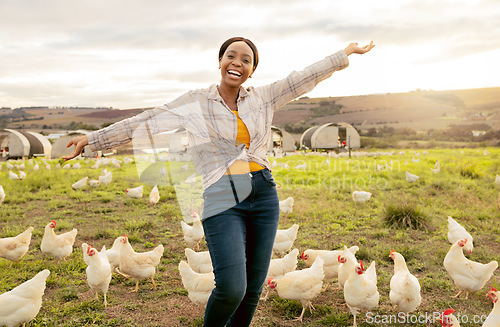 Image of Winner, farm and chickens with a black woman agriculture worker in celebration while farming in the poultry industry. Farmer, motivation and countryside with a female agricultural expert outdoor