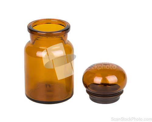 Image of Empty vintage apothecary bottle with open lid