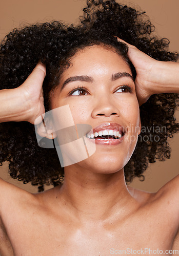 Image of Black woman, beauty and face skincare, wellness and hair care with makeup, glow or cosmetics on brown studio background. Happy female model, facials cosmetic and happy smile for healthy or clean skin