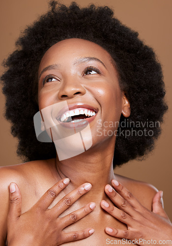 Image of Beauty, skincare and happy black woman in a studio for a health, wellness and cosmetic routine. Happiness, smile and African model with a natural facial, skin or face treatment by a brown background.