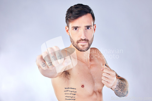 Image of Fitness, sport or man boxer with tattoo in white studio background for health wellness, exercise or training. Motivation, sports focus or male athlete model for power boxing or punching workout