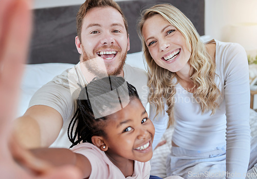 Image of Family, adoption and selfie portrait, love and smile together on bed in the morning, support and happy in home. Black girl, father and mother smile for social media photo or picture in bedroom