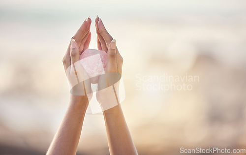 Image of Woman, crystal hands and outdoor healing in nature for zen wellness, mindfulness or peace with spirit rock. Energy stone, rose quartz or calm spiritual meditation for growth, health or relax for girl