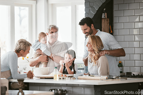 Image of Big family, love and cooking in home kitchen, bonding or having fun. Support, care and grandparents, father and mother, baby and girl baking, learning and talking while enjoying quality time together
