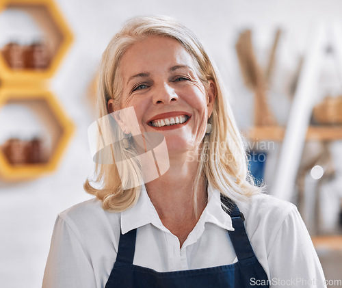 Image of Small business owner, portrait and woman with smile for startup success, product sales and sustainable marketplace. Senior manager, boss or retail worker in a cafe, store or shop with commerce goals