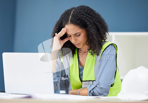 Image of Construction, stress and woman engineer at laptop, architect or contractor in office with headache from work. Burnout, anxiety and deadline for building project, black woman in safety vest at desk.