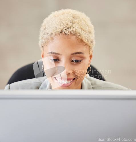 Image of Happy, business woman and computer working in a startup office. Smile and corporate entrepreneur happiness while typing email or reading online report with research or planning in a corporate company