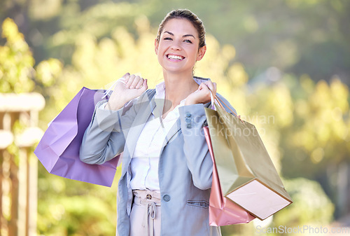 Image of Retail, shopping bag and happy with portrait of woman spending for luxury, sales and fashion spree. Gift, products and boutique with customer buying clothes for consumer, retail therapy and store