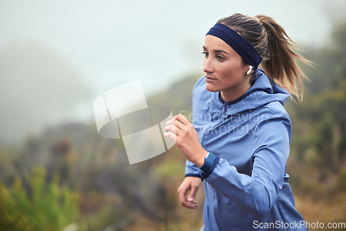 Image of Fitness, woman and running in nature for exercise, training or cardio workout in healthy wellness. Active female runner exercising in sports run for health, endurance and wellbeing in the outdoors