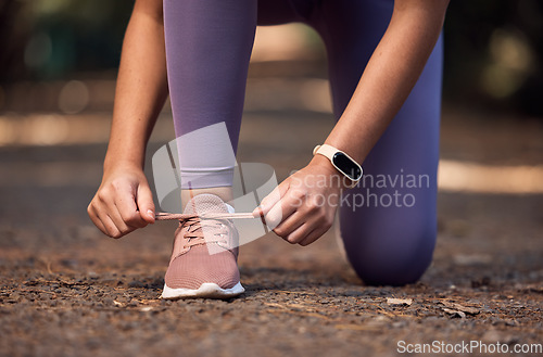 Image of Lace, shoes and sports woman city workout, cardio training and morning running outdoor. Runner, athlete and girl tie sneakers to start exercise, fitness and marathon, healthy lifestyle and wellness