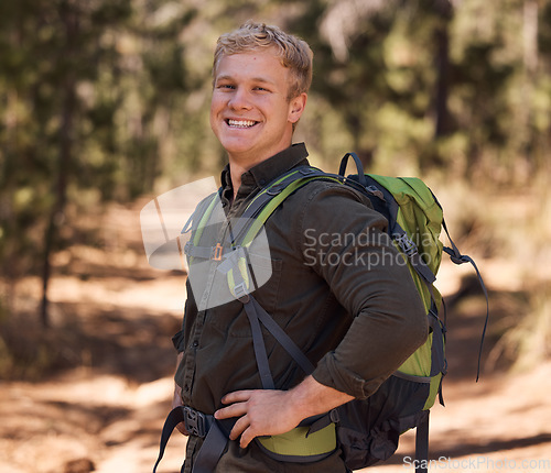 Image of Hiking forest, fitness and portrait of man trekking in woods for freedom, peace or adventure journey for body wellness. Exercise travel, training workout and backpacking hiker walking on nature path