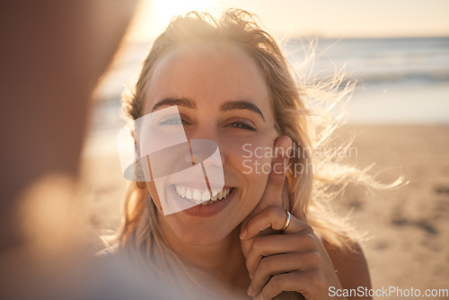 Image of Pov, couple and love on beach holiday, vacation or summer date outdoors. Portrait, romance and smile of man and woman with affection, having fun and enjoying quality time together on sandy seashore.