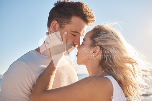 Image of Love, couple and eyes closed on beach holiday, vacation or summer date outdoors. Romance, affection and man and woman ready for kiss, having fun on honeymoon and enjoying time together at seashore.