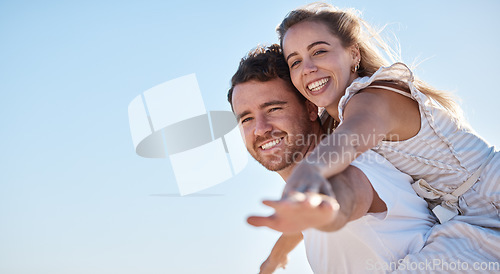 Image of Love, blue sky and happy couple together for summer, holiday and outdoor wellness, date anniversary and freedom with mockup. Happy woman and man piggyback ride for support, care and healthy lifestyle