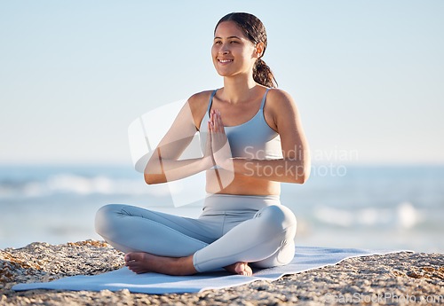 Image of Meditation, yoga or black woman for fitness on beach for zen wellness, mental health or health workout. Happy, relax and peace girl with sport exercise, pilates or chakra energy training with smile