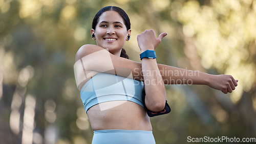 Image of Stretching, thinking and woman training in nature with music on earpods for motivation, mindset and health. Fitness, idea and athlete with podcast warm up before cardio, workout or pilates in a park