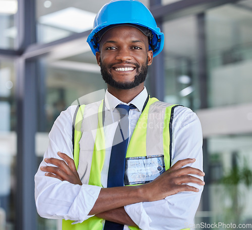 Image of Portrait, construction and engineer man or construction worker with arms crossed in industrial startup office. Architecture, builder and industry with a male business owner in architect company