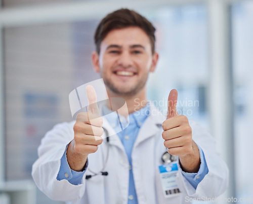 Image of Healthcare, thumbs up and portrait of doctor in hospital with hand sign for good news, agreement and success. Medical care, thank you and health worker standing in clinic for trust, support and care