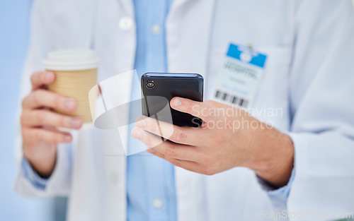 Image of Doctor, coffee break and cup, smartphone technology and mobile app, reading notification and connection in hospital. Healthcare worker hands, drinking coffee and using phone, telehealth and contact