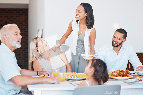 Image of Happy family, eating lunch food and dinner table meal, social gathering or family lunch in dining room together. Smile, happiness and meal celebration, brunch and quality time to enjoy in family home