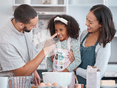 Image of Family, happy and cooking flour face fun with caring dad, mother and cute daughter in home kitchen. Wellness, baking and fun parents bonding with young child chef learning recipe in Mexico.