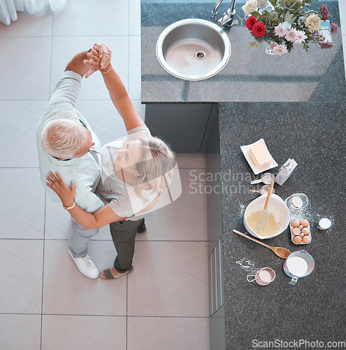 Image of Top view, bonding couple or dancing in kitchen of house or home and baking ingredients on countertop for breakfast food, cake or pastry dessert. Middle aged man or happy woman in waltz dance for love