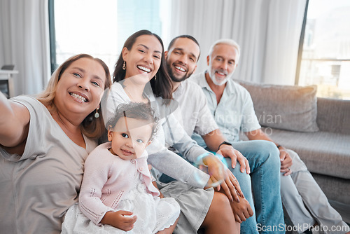 Image of Big family, selfie and happy baby, parents and grandparents together on living room couch for bonding, love and care. Portrait of men, women and child together in their Puerto Rico house with a smile