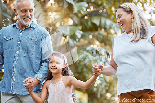 Image of Park, holding hands and grandparents with child for outdoor walking, nature wellness and development in summer, holiday and travel. Happy girl with senior family in garden bonding together with love