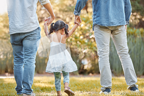 Image of Holding hands, park and girl with father and grandfather walking, support and trust in nature. Peace, love and back of a child with family men on a walk on a field in the countryside in summer