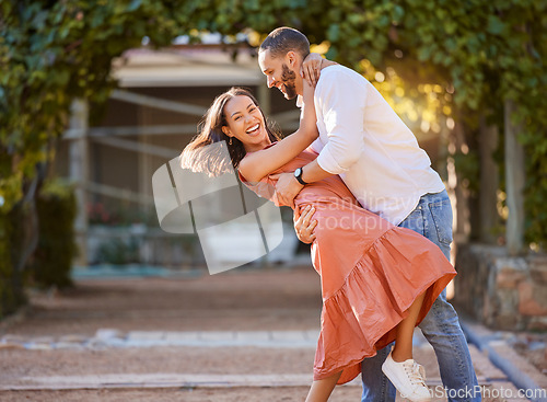 Image of Happy couple, dance and love in park, garden and sunshine for bonding, quality time and romantic date together. Smile, dancing and fun man, woman and partner, freedom and happiness outdoors in summer