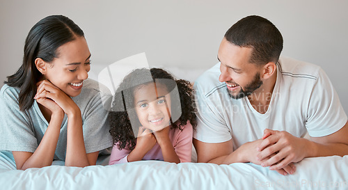 Image of Family, portrait and home with a parents relax and resting with their little girl in the family home. Mother, father and daughter for caring, loving and bond relationship in the bedroom