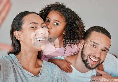 Image of Family, portrait and selfie with child, mother and father together at home for kiss, love and care with smile and happiness. Child, man and woman in Puerto Rico house for social media profile picture