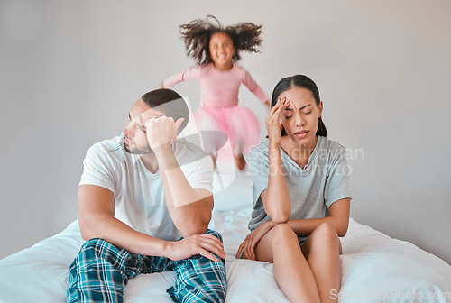 Image of Adhd, child and parents with headache, stress and anxiety for autism management, energy fatigue and home problem. Marriage, noise and frustrated, tired or chaos with mother, father and hyper fast kid