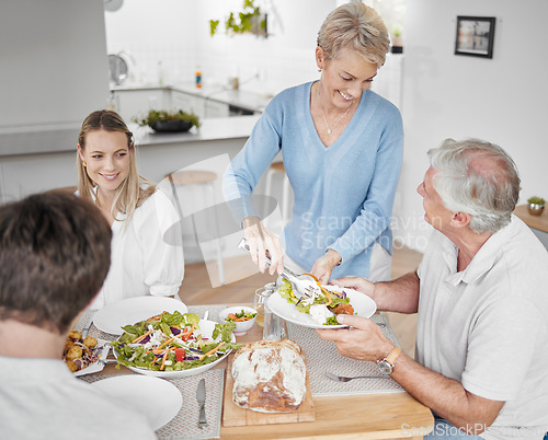 Image of Family, food and celebration with a senior man and woman at a dinner table with their son and daughter for lunch. Dish, plate and love with male and female in a retirement home to visit their parents
