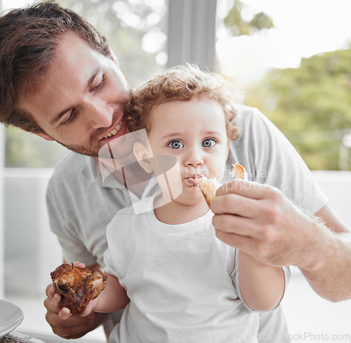 Image of Meal, father and baby eat lunch with smile, love and happy together in Germany. Portrait, food and child eating bread for nutrition, health and hungry on a lunch in dining room, house or family home