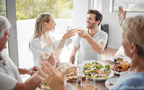 Image of Family brunch, happy celebration toast and group of people excited, cheer and celebrate couple marriage announcement. Love, wine food and good news for man, woman and parents bonding at lunch buffet