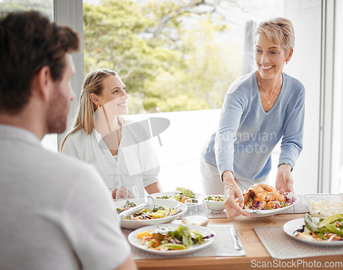 Image of Family, lunch and food for dining, meal and happy at table for celebration event, eating and happiness together. Hosting, family home and thanksgiving feast with cheerful people sharing and fresh