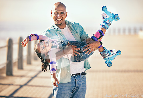 Image of Family, children and roller skating with a father and daughter on the promenade at the beach during summer. Kids, love and sports with a man and girl bonding together on roller skates for a hobby