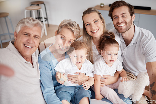 Image of Selfie, family and children with grandparents, parents and girl siblings taking a photograph in a living room together. Kids, portrait and happy with a man, woman and daughter posing for a picture