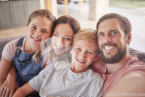 Image of Family, children and parents taking a selfie in their home on the sofa in a lounge with love, care and a smile. Portrait and faces of a father, mother and happy kids bonding and making a memory