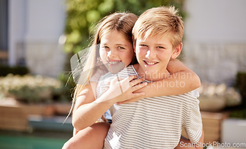 Image of Children, hug and love, piggy back and happy in portrait together, young kids outdoor and family bonding in backyard. Brother and sister smile, relationship and care, spending quality time in nature