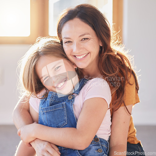 Image of Mother, love and hug girl for portrait of support, trust and relax quality time in family home. Happy mom, excited kid and smile together for happiness, gratitude connection and relationship bonding