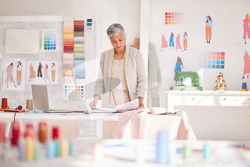 Image of Design, fashion and senior woman in workshop looking at drawing, illustration and colour palette. Fashion design, small business and mature designer working in creative studio for clothing startup