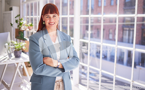 Image of Business woman, portrait smile and arms crossed for vision, ambition or career success at the office. Happy female leader or manager smiling for successful corporate design or company startup at work