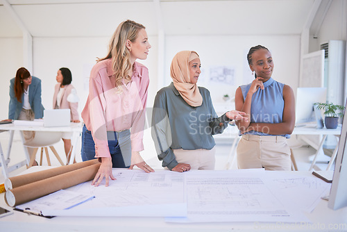 Image of Architect, building blueprint or diversity women with planning, collaboration or consulting floor design in office. Architecture, business people or teamwork for real estate property development plan