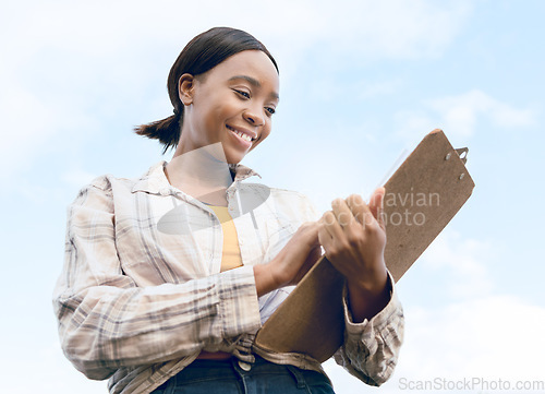 Image of Agriculture, happy farmer or black woman with clipboard for business checklist, success or analysis growth in farm with smile. Eco sustainability, blue sky or agro woman writing or stock management.
