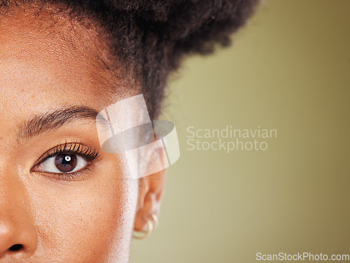 Image of Beauty, black woman and half face portrait for dermatology, facial or skincare advertising. Wellness, health and natural skin cosmetic zoom of model with green studio mockup for marketing.